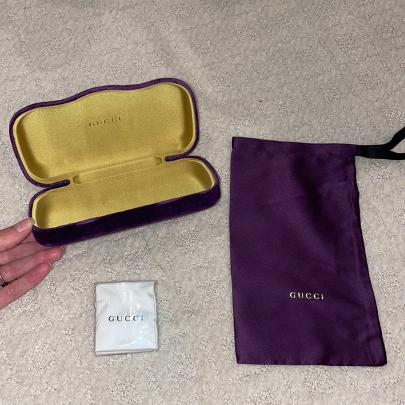 Authentic GUCCI sunglass case, soft carry bag, and glasses cleaner.
